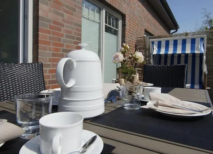 Inselparadies - Neubauwohnung mit großer Terrasse, Strandkorb und Garten.